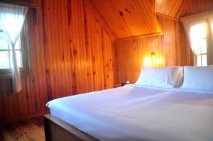 Postel nebo postele na pokoji v ubytování Hillock Villa