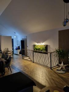 a living room with a fish tank on the wall at Vrh house in Ravna Gora
