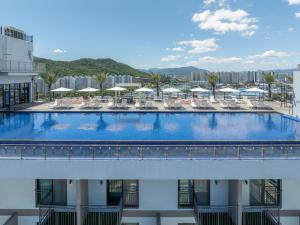 a large swimming pool on the roof of a building at Chestertons Gyeongju in Gyeongju