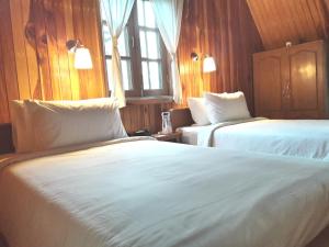 Postel nebo postele na pokoji v ubytování Hillock Villa