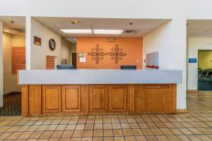 an empty waiting room with a counter in a hospital at Clarion Hotel Jackson Northwest in Jackson +62 photos