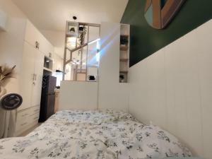 a bedroom with a bed in a room at Naomi's Green Haven in Dasmariñas +42 photos