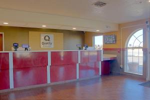 a waiting room with a red counter in a hospital at Quality Inn & Suites Roswell North in Roswell +34 photos