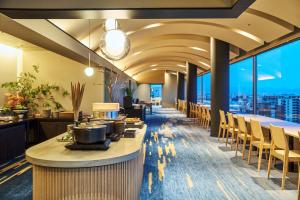 a restaurant with a view of the city at Hotel Global View Urawa in Saitama +23 photos