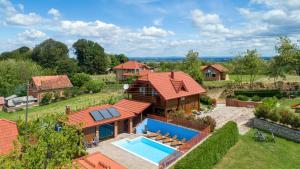 an aerial view of a house with a swimming pool at Villa Nina by Villas Guide in Ludbreg