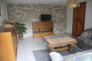 TV a/nebo společenská místnost v ubytování Apartments Sarazena