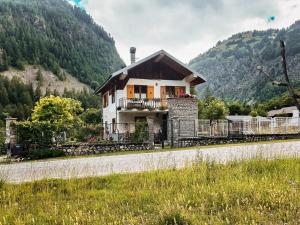 a house on the side of a road at B&B del Villaggio in Argentera