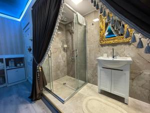 a bathroom with a shower and a sink at Otantik Shumen in Shumen +114 photos