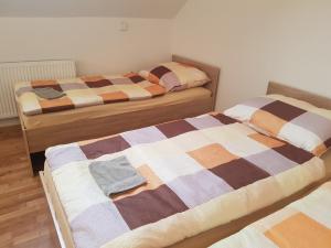 Postel nebo postele na pokoji v ubytování Ubytování Žižkova Pacov
