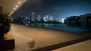 a view of a city skyline at night at High floor City view 2BR condo in Johor Bahru