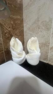 two baskets sitting on a counter in a bathroom at High floor City view 2BR condo in Johor Bahru +11 photos