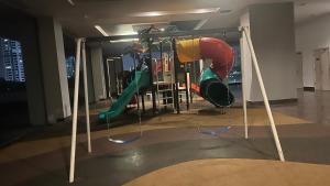 a play area with a slide and a playground at High floor City view 2BR condo in Johor Bahru