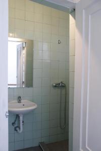 Koupelna v ubytování Down Bonjardim Apartments
