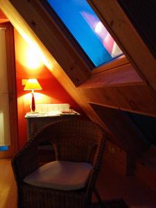 Posezení v ubytování Cosmeur B&B