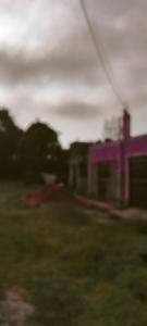 a blurry picture of a building in a field at Yua Residence in Machakos +8 photos