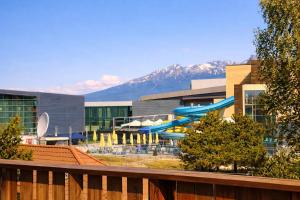 a view of a building with a water slide at Aqualand Penzion - free parking in Poprad