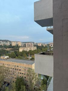 a view of a city from a building at welcome apartment in Itʼkhvisi