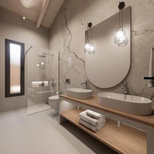 a bathroom with two sinks and a mirror and a toilet at Villa Morena in Kypseli +15 photos