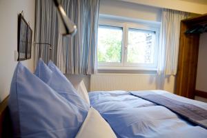 Posteľ alebo postele v izbe v ubytovaní Gerda Wellness Apartment + 37 fotografií