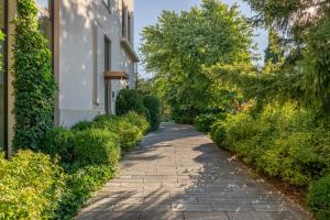 a stone path in front of a building at Alter Hotel in Barge +94 photos