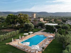 an aerial view of a resort with a swimming pool at Masseria Salamina in Fasano