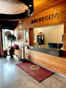 a lobby of a restaurant with a sign that reads lerecova at Hotel Dolenjc in Novo Mesto +71 photos