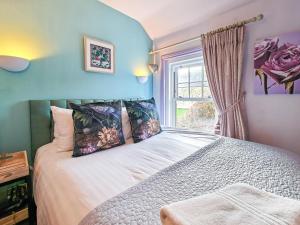 a bedroom with a bed and a window at 2 Bed in Morpeth oc-l35201 in Morpeth
