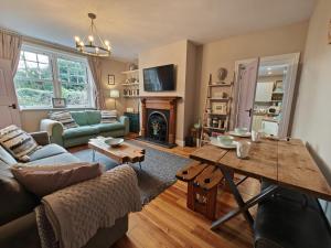 a living room with a couch and a table at 2 Bed in Morpeth oc-l35201 in Morpeth