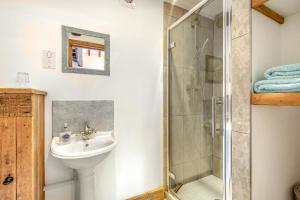 a bathroom with a sink and a shower at 3 Bed in Tenterden oc-p36303 in Tenterden +16 photos