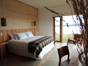 Hotel Simple Patagonia 객실 침대