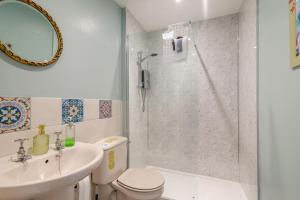 a bathroom with a sink and a toilet and a shower at 2 Bed in Shepley oc-c36884 in Shepley +15 photos