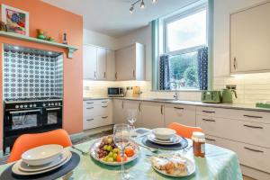 a kitchen with a table with food on it at 2 Bed in Shepley oc-c36884 in Shepley
