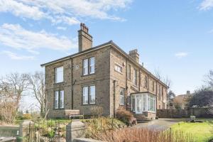 an old brick house with a chimney on top at 2 Bed in Shepley oc-c36884 in Shepley