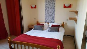 Postel nebo postele na pokoji v ubytování Hotel Ô Fil de L'ô