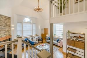 an open living room with a staircase and a living room at 3 Bed in Dunning oc-t35973 in Dunning