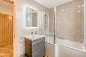 a bathroom with a white sink and a shower at 3 Bed in Dunning oc-t35973 in Dunning +21 photos