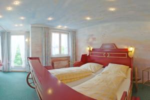 Postel nebo postele na pokoji v ubytování Hotel Plankl