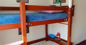 two bunk beds in a room with a lamp at Room for you in Warsaw