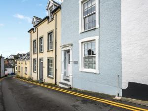 a row of houses on the side of a street at Pandy Cottage in Aberdyfi