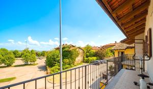 a balcony with a view of a street at Casa Speranza in Narzole