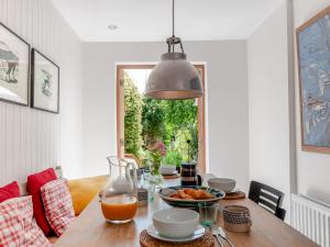 a dining room table with a bowl of food on it at 3 Bed in Whitstable oc-wcc17 in Whitstable
