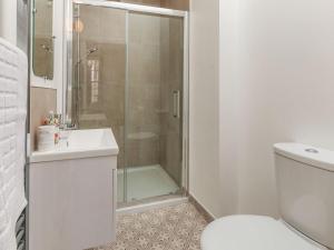 a bathroom with a shower and a toilet and a sink at 5 Bed in Margate oc-86551 in Margate +18 photos