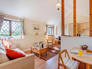 a living room with a couch and a table at 1 Bed in Tunbridge Wells oc-79180 in Wadhurst
