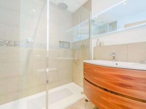 a bathroom with a sink and a glass shower at 2 Bed in Montgomery oc-83244 in Llandyssil +20 photos