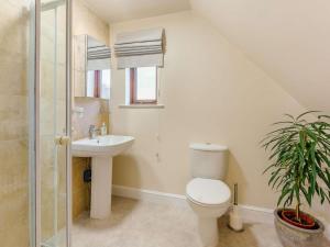 a bathroom with a toilet and a sink at 4 Bed in Ashford oc-86647 in Ashford +20 photos