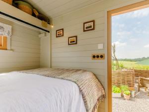 a bedroom with a bed and a window at 1 Bed in Canterbury oc-88795 in Chillenden