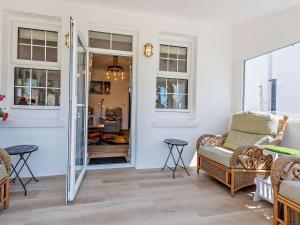 a living room with a couch and a table at 3 Bed in Bognor Regis oc-83115 in Bognor Regis