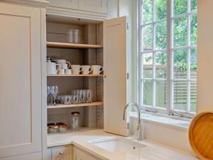 a kitchen with a sink and a window at 3 Bed in Colchester oc-94016 in Dedham