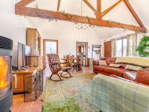 a living room with a couch and a table at 2 Bed in Lincoln oc-93058 in Saxilby