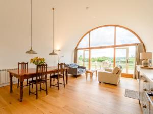a kitchen and living room with a table and chairs at 1 Bed in Cranbrook oc-76565 in Rolvenden
